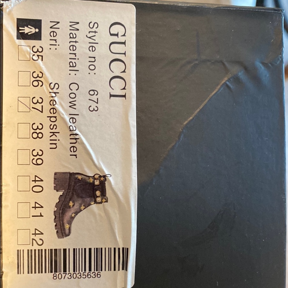 New never worn- Gucci Black Leather Ankle Boots with Gold Studs